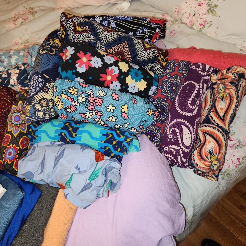 Lula Roe- 16 leggings, 9 shirts and 2 cardigans